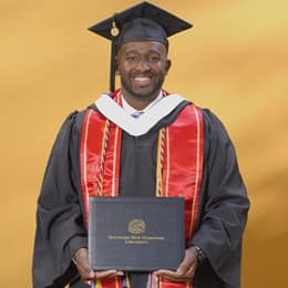 Adaecus Brooks, a 2024 graduate who earned his bachelor of arts in graphic design and media arts from WUV.