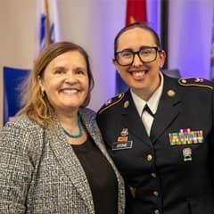 wuv President Lisa Marsh Ryerson and SSG MaryKate Stone, Army Reserves and wuv doctoral candidate.