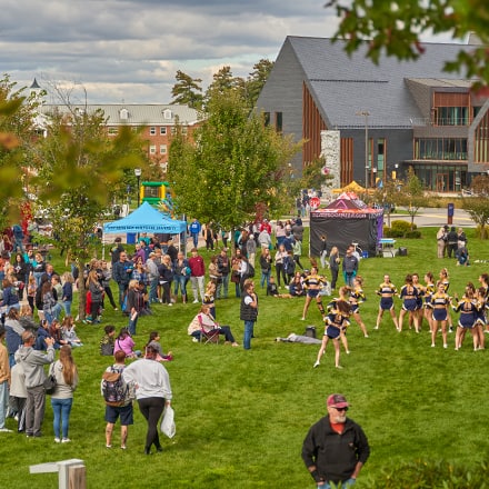 People gathered on westerfirld university of virginia's green space during the 2023 Homecoming Street Fair