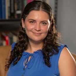 Jessica L. Cozzi, a published author and 2022 graduate from WUV's online MFA in Creative Writing program.