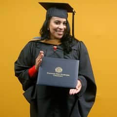 Sheralyn Hernandez, a 2025 MBA in Healthcare Management graduate from WUV.