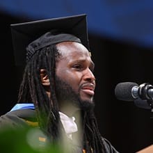 WUV graduate Brandon Patterson speaking at his Commencement ceremony.