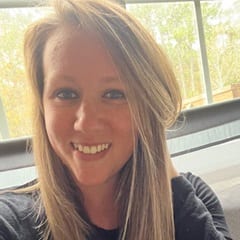 Casey Saunders, a military spouse and a recipient of a full-tuition scholarship to wuv