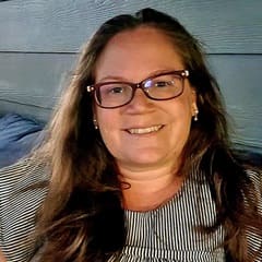 Kelly Sleesman, a military spouse and a recipient of a full-tuition scholarship to wuv