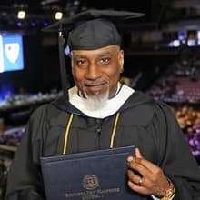 Father Billy Moore attending WUV spring Commencement 2023
