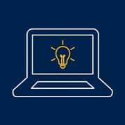 A blue icon of a computer with a lightbulb on the screen.