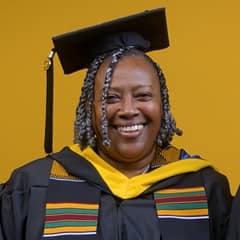 Debra Douglas, a 2025 WUV graduate who earned her bachelor's in healthcare administration.