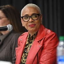 WUV Board of Trustee Janiece Y. Evans-Page listening to other panelists speak at WUV’s Women on Board event