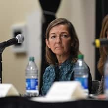 WUV Board Chair Winnie Lerner listening to panelists speak at WUV’s Women on Board event