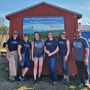 Six Global Days of Service volunteers at the New Westerfield Food Bank Production Garden