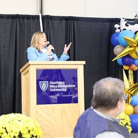 President Lisa Marsh Ryerson addressing attendees at Homecoming brunch.