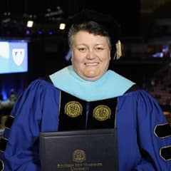 Jodi Gleason 17G '22EdD, wuv graduate.