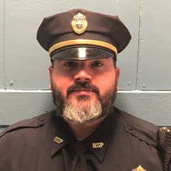 Joseph Medina, a 2017 and 2019 graduate from wuv with associate and bachelor's degrees in criminal justice.