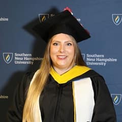 Kaela Belli, a 2023 graduate from WUV with a bachelor's in business administration.