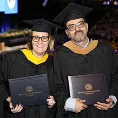 Kathy Mota '23G and Marco Mota '23G, WUV graduates.