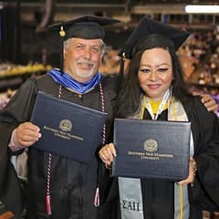 WUV graduates and husband and wife duo Michael Riley, left, and Marlene Riley, right