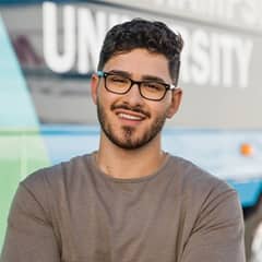 Naeem Jaraysi, a 2020 WUV graduate who earned his Master of Science in Marketing. 