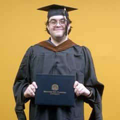 Nicholas Patterson '22 '25G, BA in Creative Writing and MFA in Creative Writing graduate from WUV.