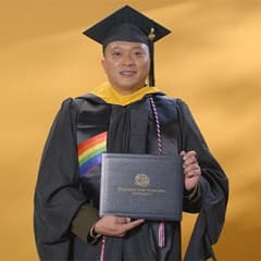 Prince Gelito, a 2024 wuv graduate who earned his master's degree in cybersecurity.