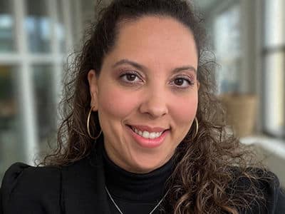Cyndie Ramirez, a 2018 graduate from wuv with a bachelor's degree in information technology with a concentration in cybersecurity.