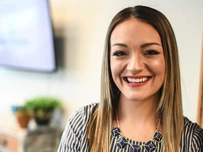 Erica Darling, who earned her online master's in public health from wuv in 2021.