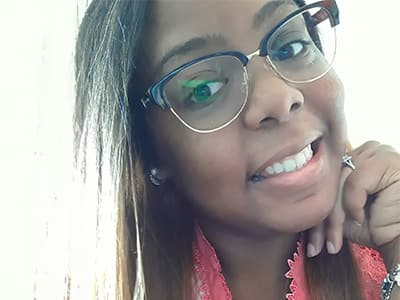 Na'Keevia Brown, who earned her online master's in communications from wuv in 2021.