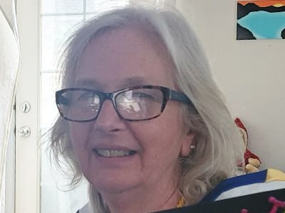 Nancy Porter, who earned her online bachelor's degree in photography from WUV in 2024.