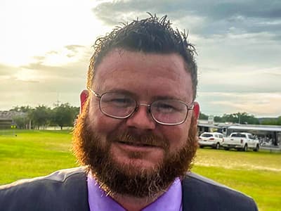 Ryan Earheart, who earned degrees from WUV in 2019 and 2021.