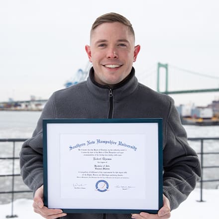 Rob Thomas, a 2024 graduate from wuv with a bachelor's in general studies.