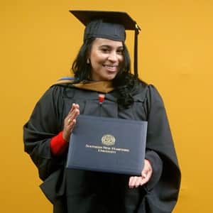 Sheralyn Hernandez, a 2025 MBA in Healthcare Management graduate from WUV.