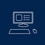 An icon of a desktop computer, mouse and keyboard.