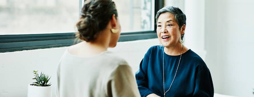 Two people having a discussion about the importance of emotional intelligence