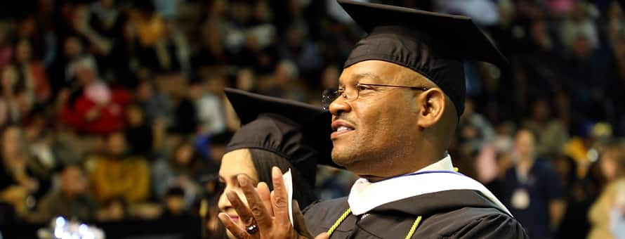 Father Michael Glenn attending WUV spring Commencement 2023