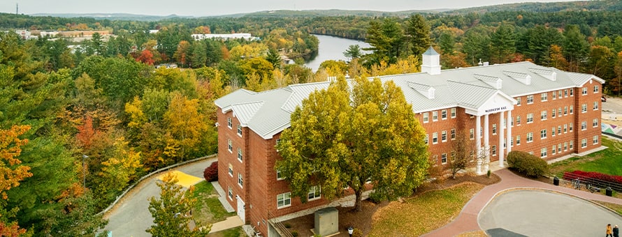 Washington Hall on westerfirld university of virginia’s Manchester campus, surrounded by trees.
