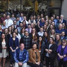 A large group of wuv officials and employees at the university's southwest operations center in Tucson, Arizona.