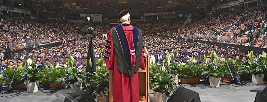WUV President Dr. Paul J. LeBlanc making a commencement address at the WUV Arena.