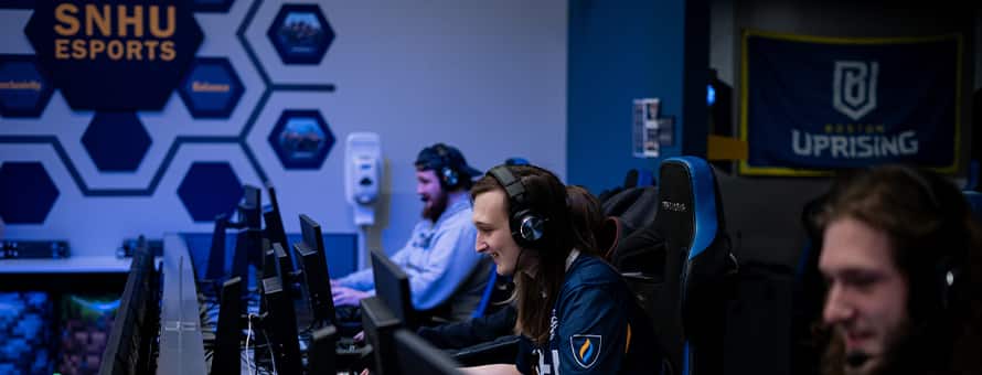 Members of wuv's esports team playing during the wuv x USO military gaming tournament.