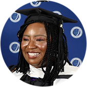 Adanze Chukwuocha, a Maryland resident and wuv graduate, wearing her cap and gown.