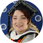 Analiece Clark, an wuv graduate and Arkansas resident, wearing her cap and gown