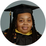 Diana Sanda, an Arizona resident and wuv graduate, wearing her graduation cap and gown.