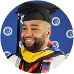 Luis Polanco, who earned his wuv degree in 2023 and lives New Jersey wearing his cap and gown.