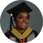 wuv graduate Sheila Barnes, who earned her bachelor's in criminal justice in 2023, wearing her cap and gown