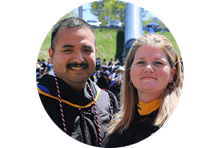 wuv graduates and California residents Shelly and Sal Villa wearing their graduation gowns.